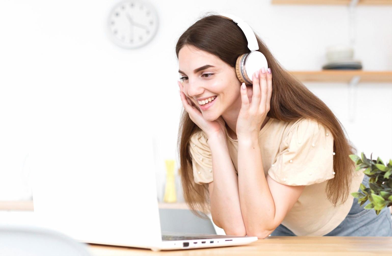 Student learning on laptop in comfortable home environment